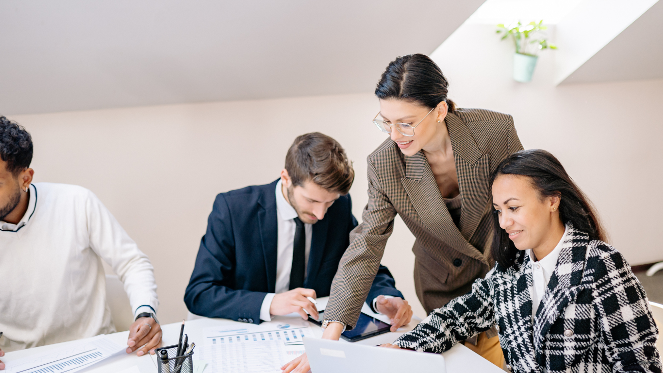 Consulting team collaborating on financial and operational reports